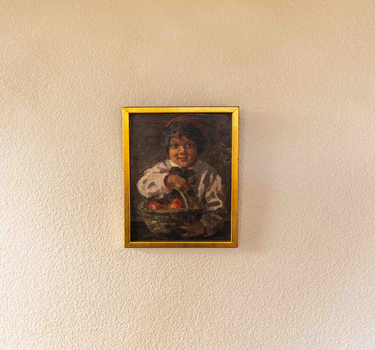 VINTAGE EUROPEAN BOY WITH APPLE BASKET OIL ON CANVAS PAINTING, 20TH CENTURY